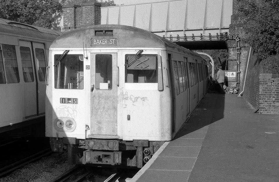 An Underground Train Wedged Against The Platform At Ruislip