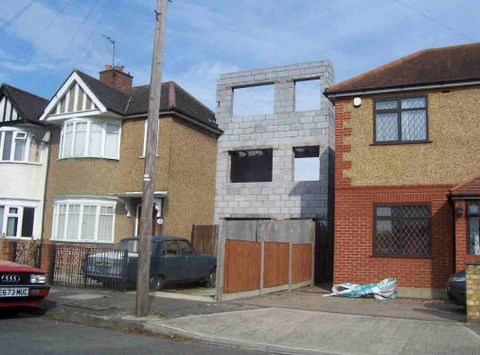 Three storey extension on two story house in Ruislip